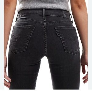 Women’s 710 super skinny Levi’s jeans in washed black size 28